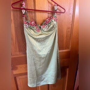 Princess Polly green dress with flowers, never worn. Silky. Size small.